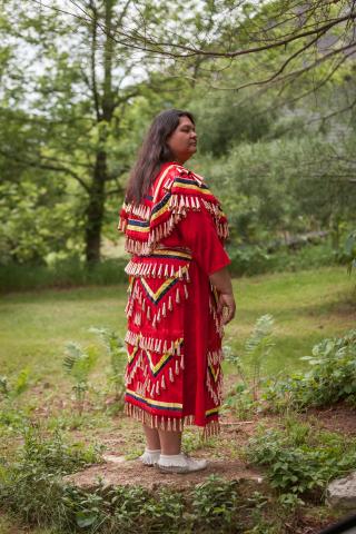 Author Kim Sigafus dressed in Native regalia.